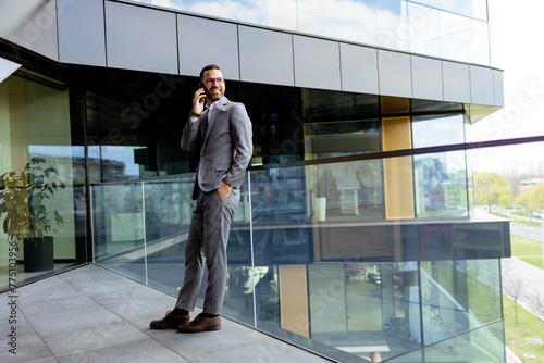 Confident Businessman Smili...