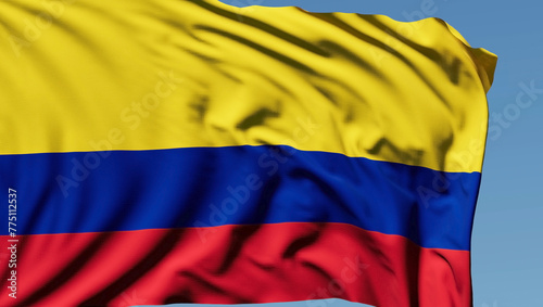 Foto Close-up of the national flag of Colombia flutters in the wind on a sunny day