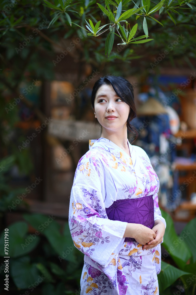 portrait woman with yukata dress in the garden portrait woman with yukata dress in the garden