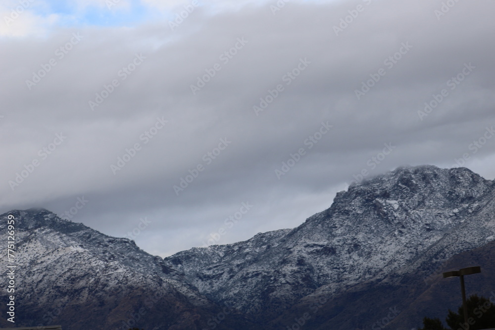 Snowy Mountains Under Overcast Skies