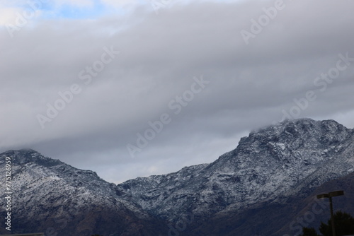 Snowy Mountains Under Overcast Skies