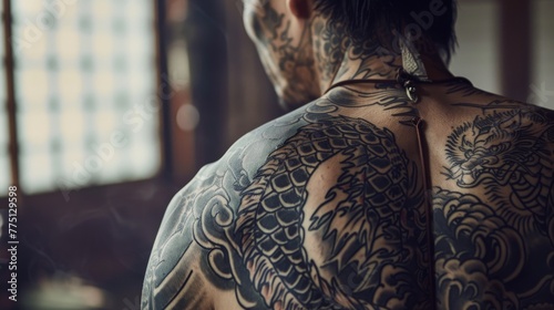 Close-up of a Yakuza member's tattooed back, intricate ink telling stories of loyalty and violence in hushed tones photo