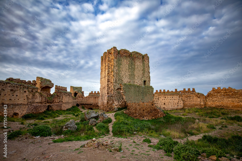 Panoramic view of the abandoned interior of the medieval walled castle of Almoacid in Toledo, Castilla la Mancha, Spain, with morning light