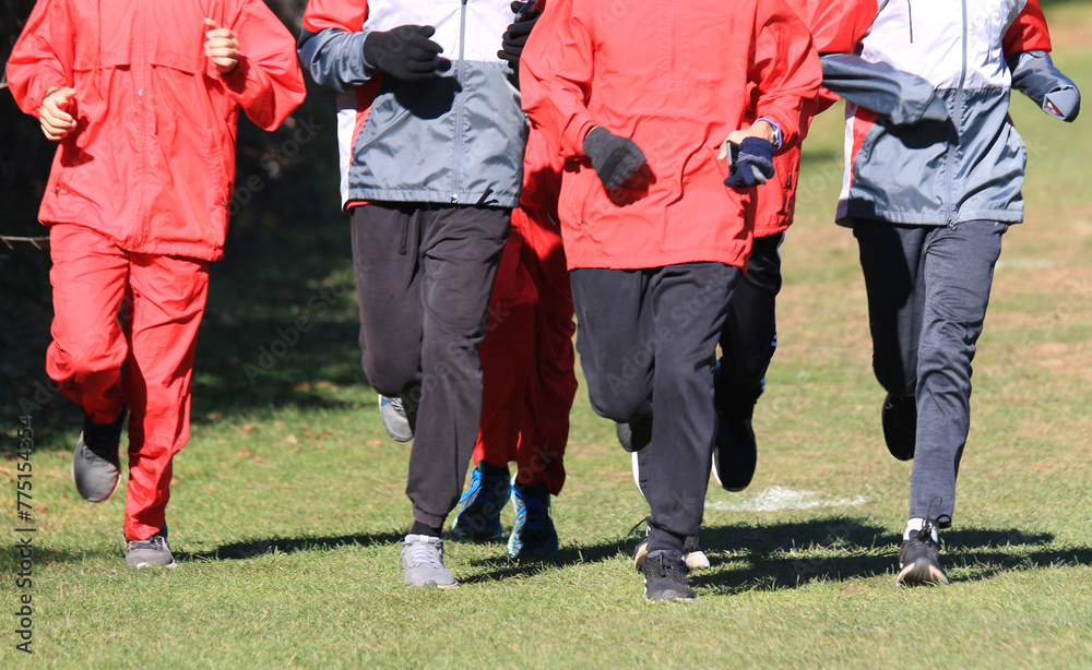 Group of People Running on Field Group of People Running on Field