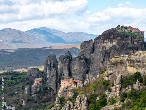 Meteora Monasteries and the surrounding rock formation on a partly cloudy day 10