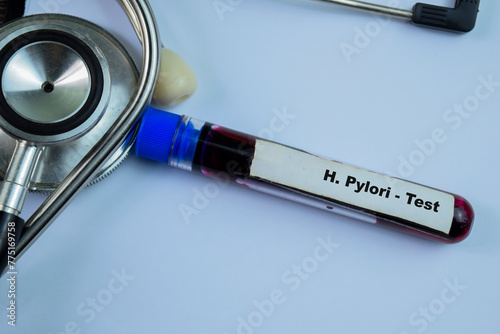 H. Pylori - Test with blood sample on wooden background. Healthcare or medical concept