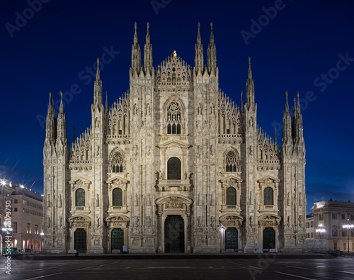 MILAN, ITALY - MARCH 4, 2024: The westfacade of Duomo - cathedral at dusk
