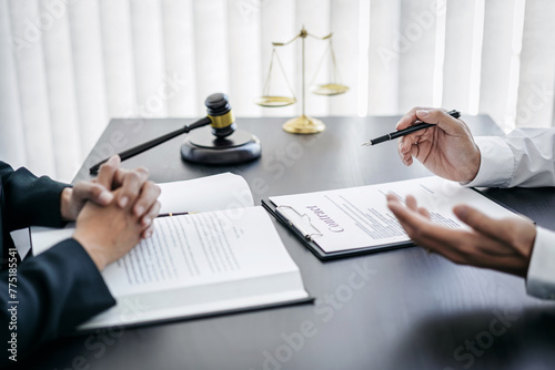 Male lawyer or notary working consulting and discussion to businesswoman client in the office, Law and Legal services concept photo