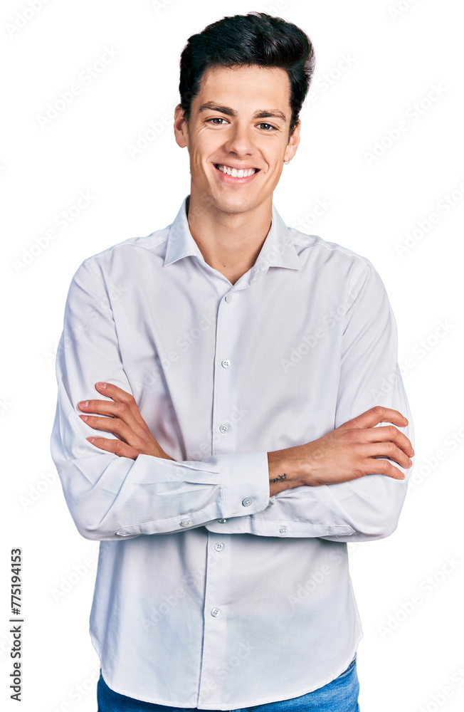 Young hispanic business man wearing business clothes happy face smiling with crossed arms looking at the camera. positive person. Young hispanic business man wearing business clothes happy face smiling with crossed arms looking at the camera. positive person.