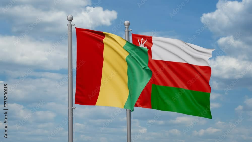 Oman and Republic of Guinea two flags waving together, looped video, two country cooperation concept Oman and Republic of Guinea two flags waving together, looped video, two country cooperation concept