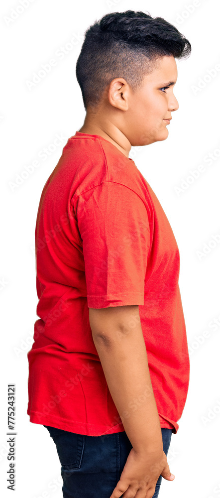 Fototapeta premium Little boy kid wearing casual clothes looking to side, relax profile pose with natural face with confident smile.
