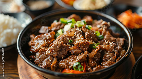Korean Beef Bulgogi with Vegetables and Sesame, Traditional Korean Beef Bulgogi in Ceramic Dish