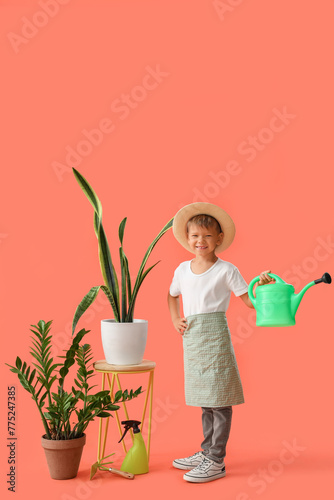 Cute little gardener with w...