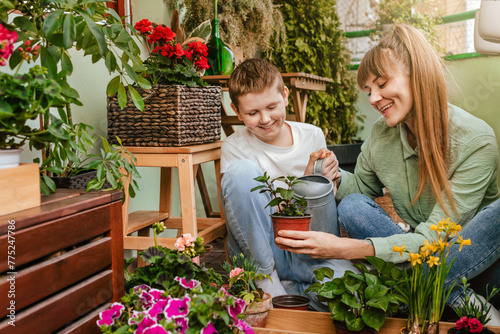 Obraz na płótnie Mother and Son Gardening Together at City Balcony w salonie