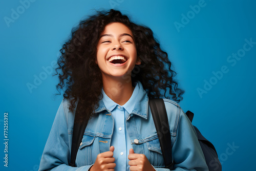 Experience the joy of learning with a smiling and cheerful Gen Z Latin girl, the epitome of youthful exuberance. Clad in a denim Generative AI, photo