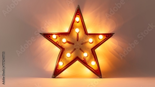 Illuminated marquee star with warm glow