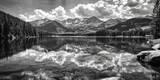 Serene mountain lake in black and white, perfect for nature-themed projects