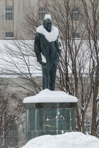 Snow-Covered Statue of a Man in Rjukan Center