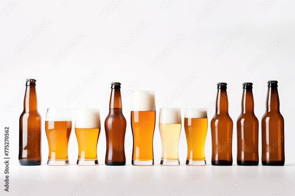 A neat lineup of beer bottles next to filled glasses on a white background, displaying different stages of beer consumption. Assorted Beer Bottles and Glasses Isolated A neat lineup of beer bottles next to filled glasses on a white background, displaying different stages of beer consumption. Assorted Beer Bottles and Glasses Isolated