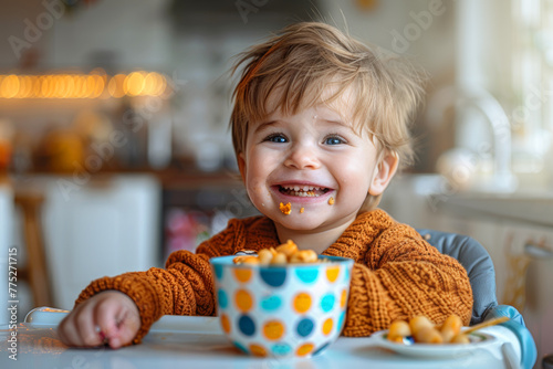 Little boy laughing at lunch time