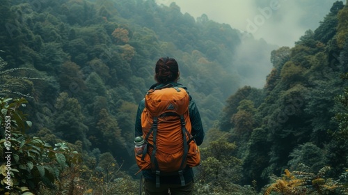A woman with a backpack standing in front of trees and mountains, AI