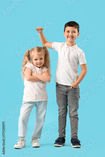 Cute little kids measuring ...
