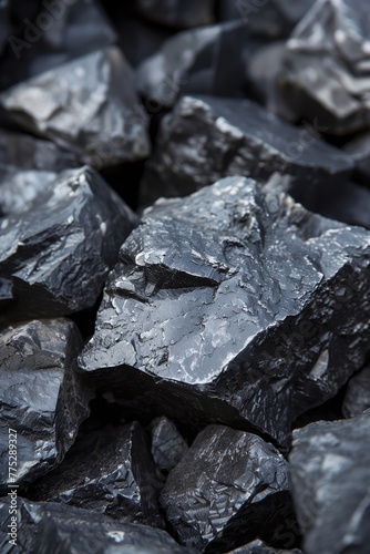 Macro shot focusing on the coal-like texture and rich details of manganese ore