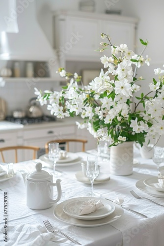 A beautifully set table with white plates and silverware, perfect for formal dining occasions