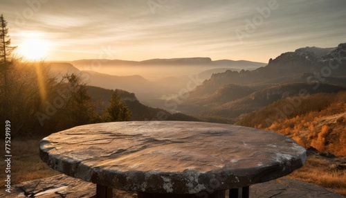 outdoor rock table top with mountain landscape at sunrise showcasing organic beauty