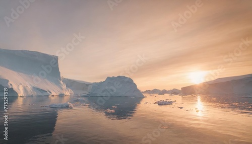 antarctic nature landscape with icebergs in greenland ice fjord during midnight sun