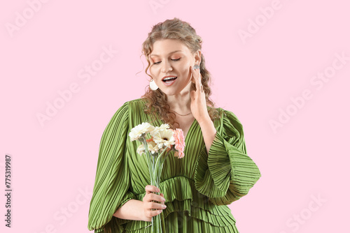 Pretty young woman with bea...
