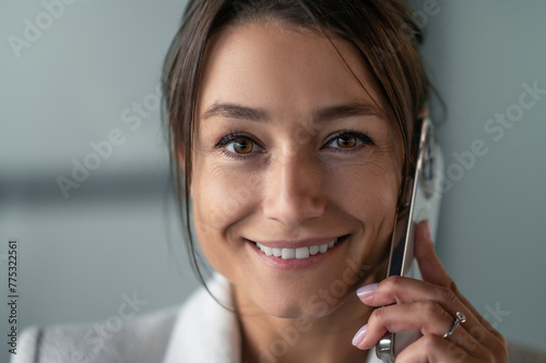 Portrait of a business woman with a phone in hand