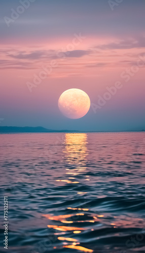 sunset with full moon over the sea