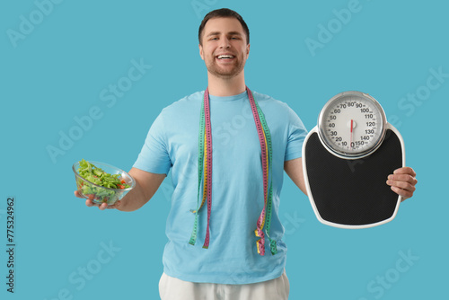 Young man with measuring ta...