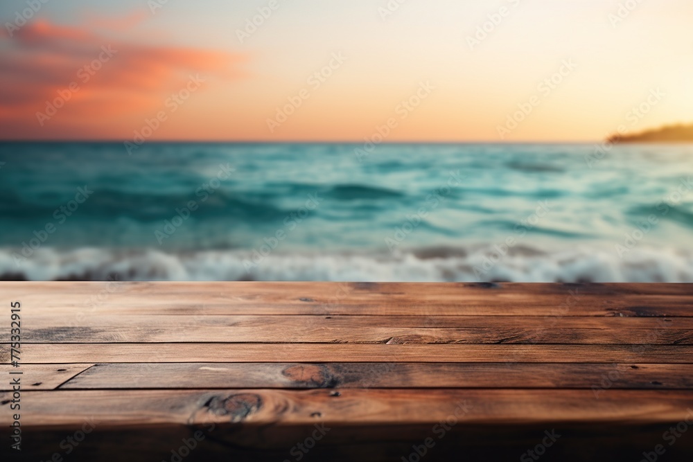 Empty wooden tabletop mockup for promotional items with blurred background and pink cloudy sky over wavy sea