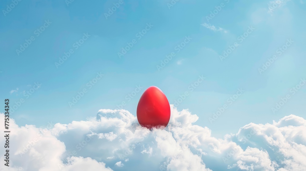 red egg on a background of clouds. - obrazy, fototapety, plakaty 