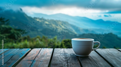 cup of coffee table beautiful landscape