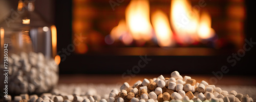 Compressed wood pellets infront of fireplace. Firewood copy space for your text. photo