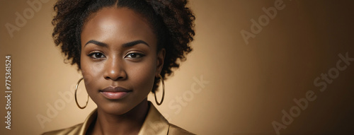 African American 30-35 Years Woman Isolated On A Gold Background With Copy Space