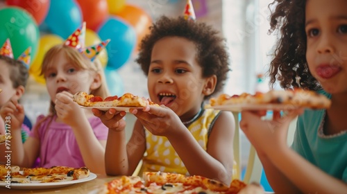 Cheerful children enjoying a pizza party with colorful balloons photo