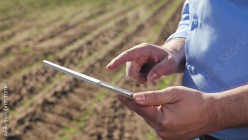 Businessman digital agricultural farmer with tablet. Hands palms use gadget tablet check current data on weather prices for agricultural products new technologies access to useful business information