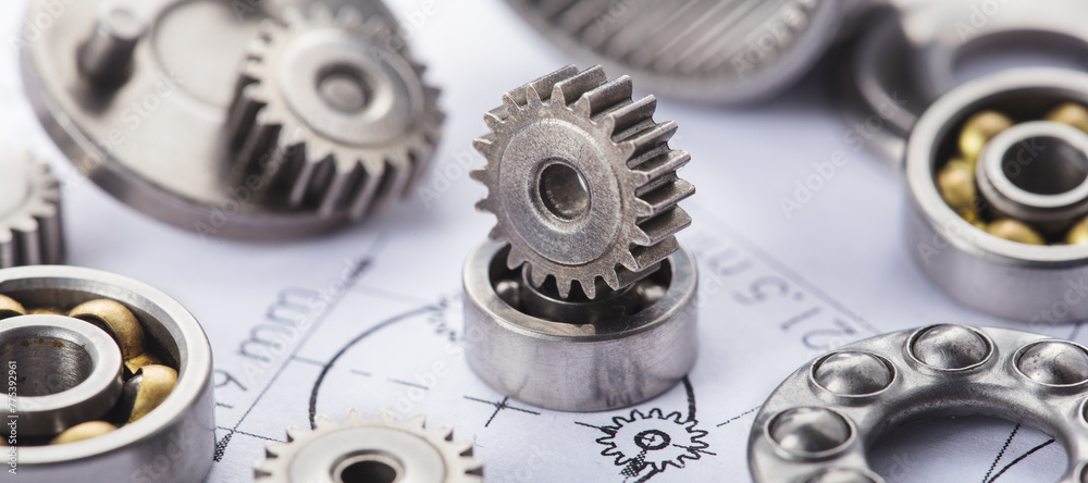 Obraz premium Gears, bearings and mechanism parts.Elements of mechanical blocksand construction.