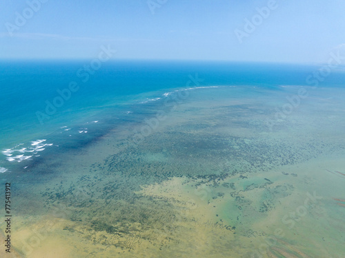 Scenery of offshore shoals in Wenchang, Hainan, China © hu