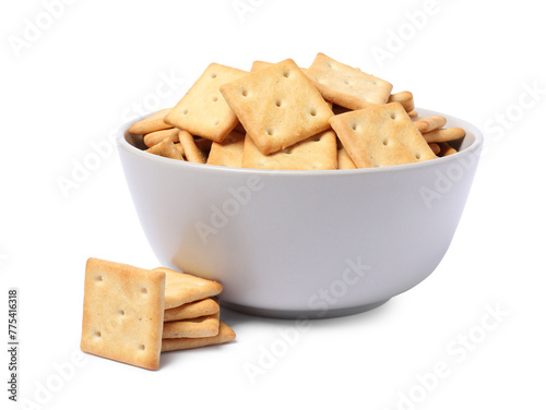 Tasty crackers in bowl isolated on white