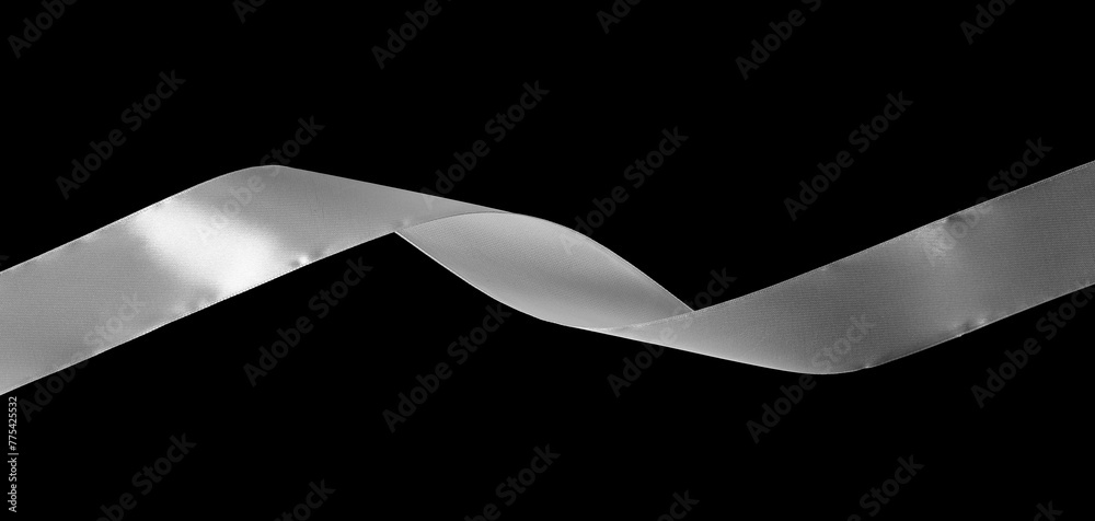 White ribbon isolated on black background, top view White ribbon isolated on black background, top view