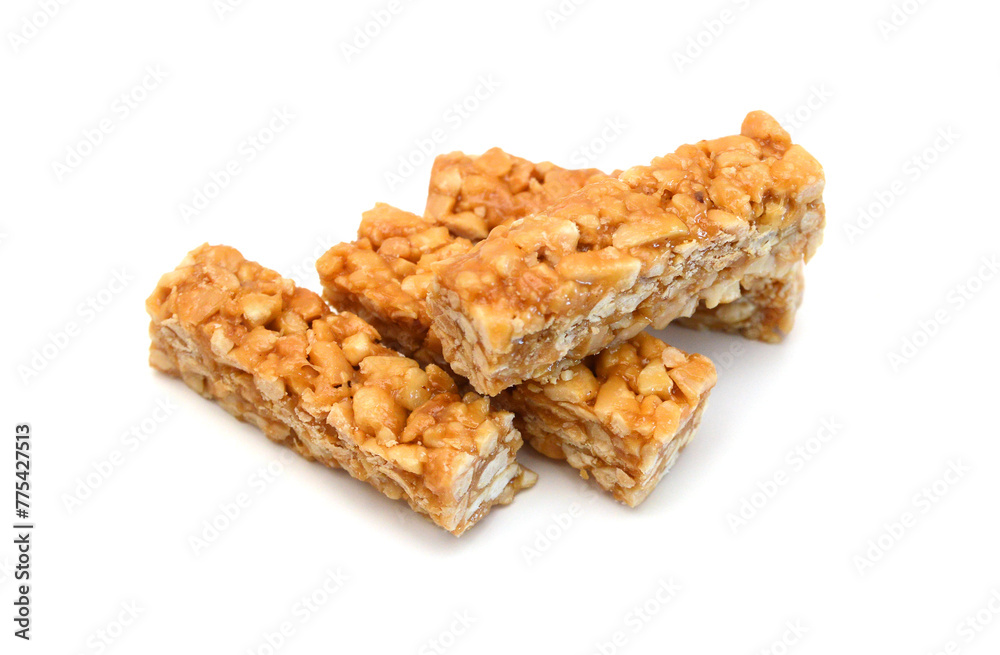 Peanut bars with nuts isolated on white background. Peanut bars with nuts isolated on white background.