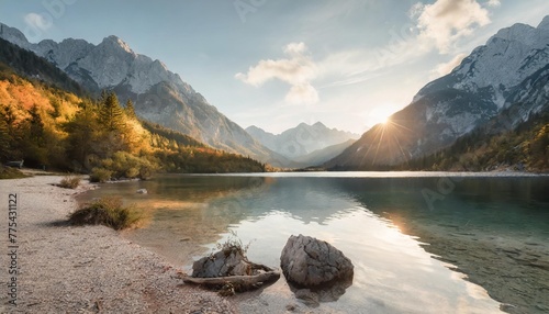 awesome alpine highlands in sunny day amazing mountain lake in slovenia in sunny day famous jasna lake in julian alps wonderful nature landscape in autumn popular travel and hiking destination photo