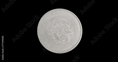 Obverse of Armenia coin 100 dram 2003, isolated in black background. Loopable animation in 4k resolution video.