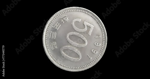 Reverse of South Korea coin 500 won 1991, isolated in black background. Loopable animation in 4k resolution video.
