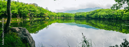 A panoramic view in late summer over the Yonko (fourth) lake of Shiretoko Goko Lakes in Shiretoko National Park, a UNESCO World Natural Heritage site in Hokkaido of Japan.